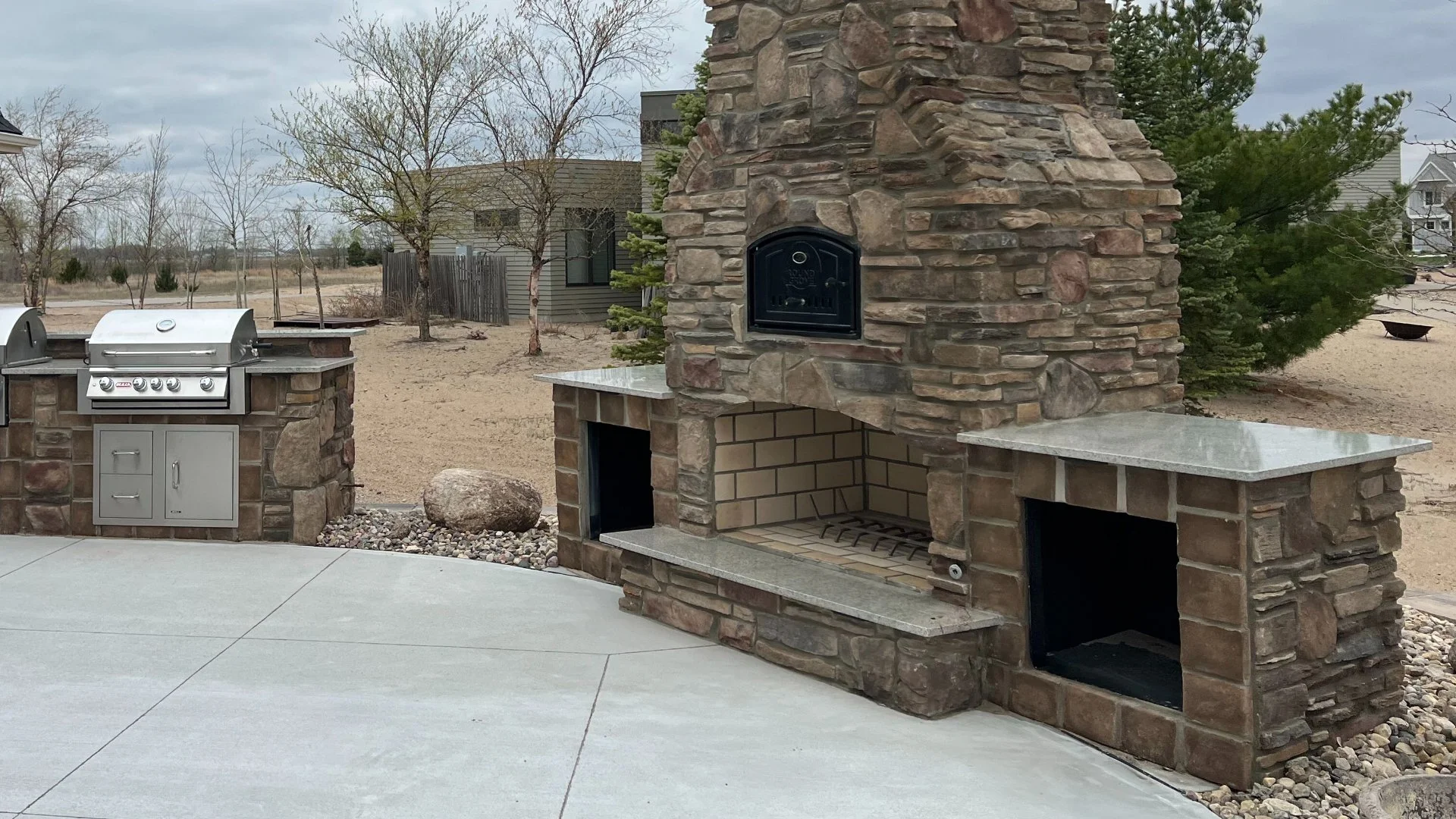 Is an Outdoor Fireplace Safer Than a Fire Pit?