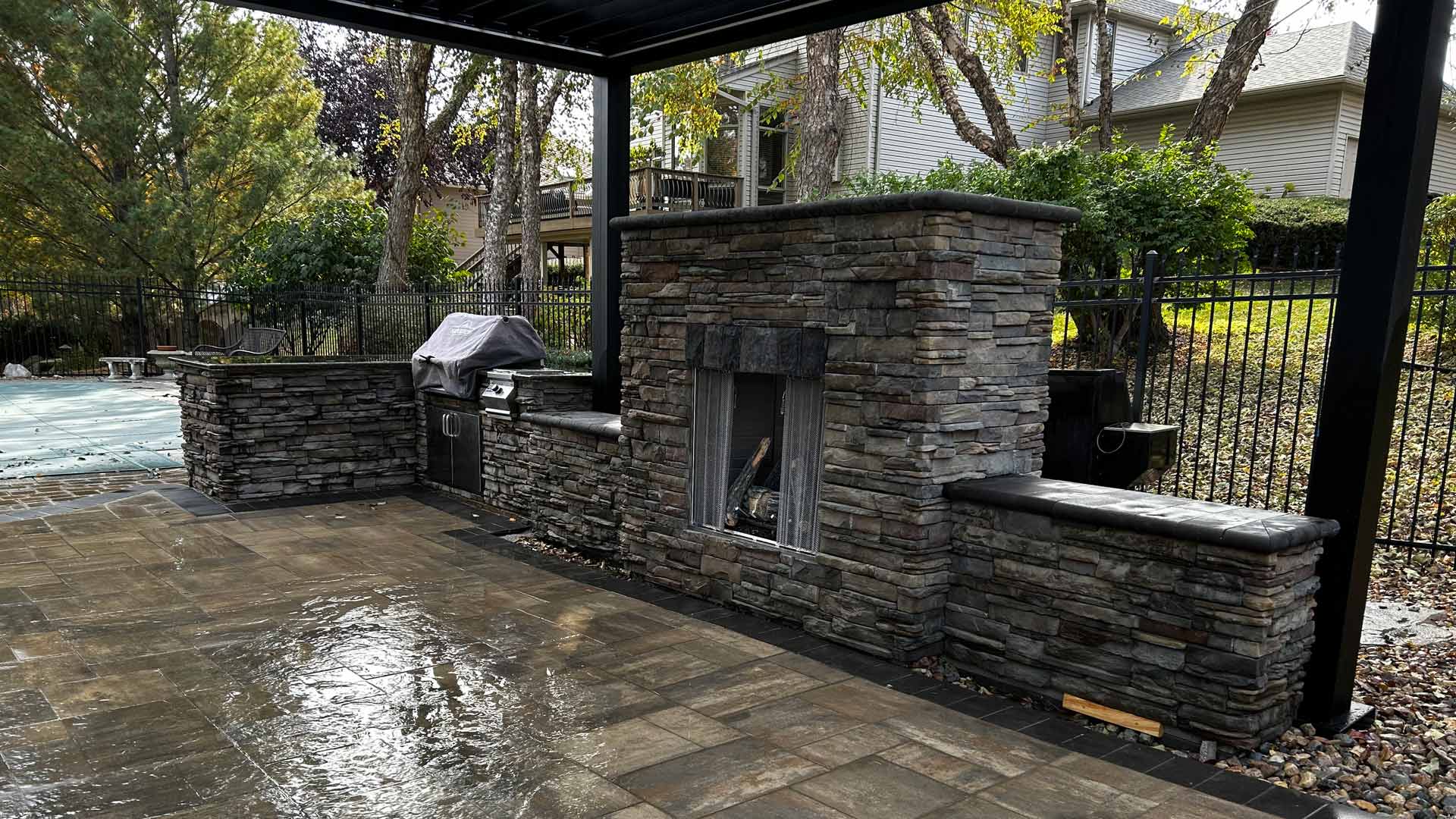 Backyard transformation with hardscape features in Omaha, NE.