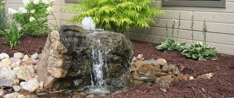 Bubbler in a mulched landscape area in Omaha, NE.