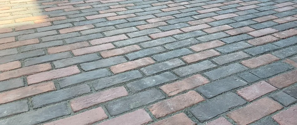 Pavers installed in a stack bond pattern for a driveway in Omaha, NE.