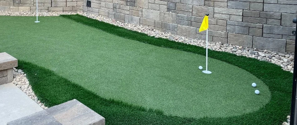 Putting green with golf balls in Omaha, NE.