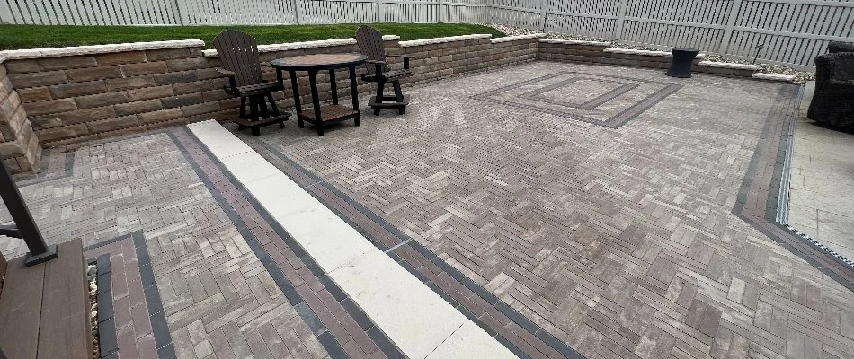 Retaining wall around a paver patio in Omaha, NE.
