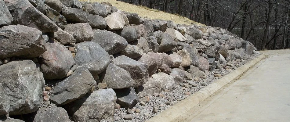 Retaining wall in Omaha, NE, made from large stones.
