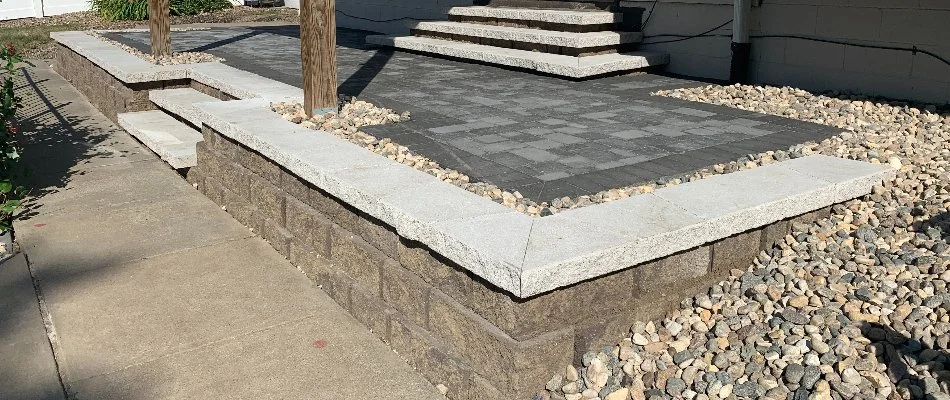 Small retaining wall with a patio in Omaha, NE.