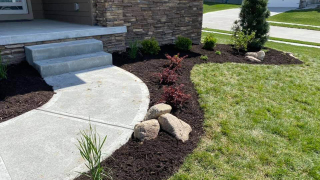 Landscape bed cleanup in Omaha, NE.
