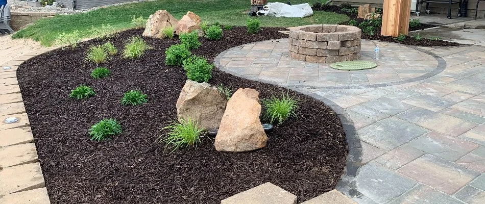 Landscape bed with mulch on a property in Omaha, NE.