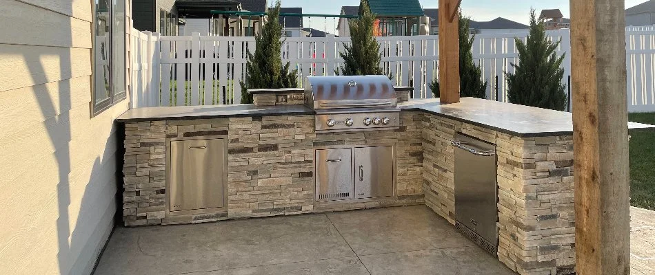 Outdoor kitchen under a pergola in Fort Calhoun, NE.