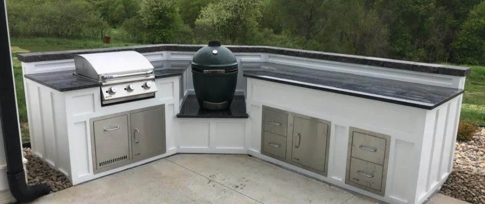 Outdoor kitchen with grill and green egg in Omaha, NE.