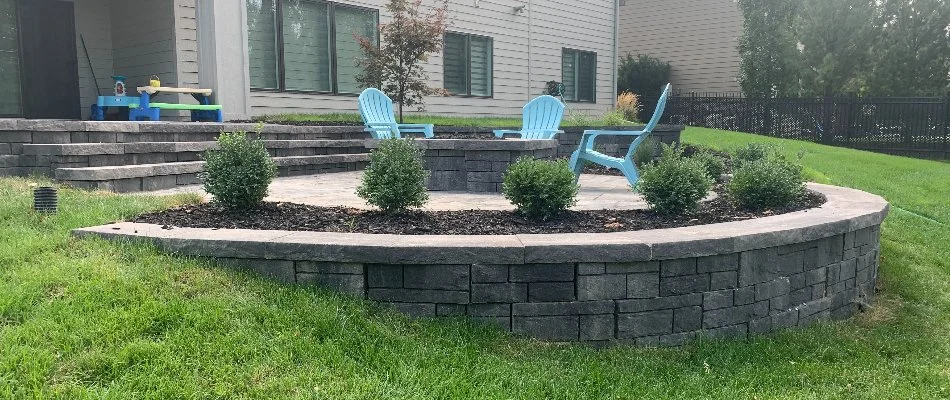 Retaining wall and patio area on a property in Omaha, NE.