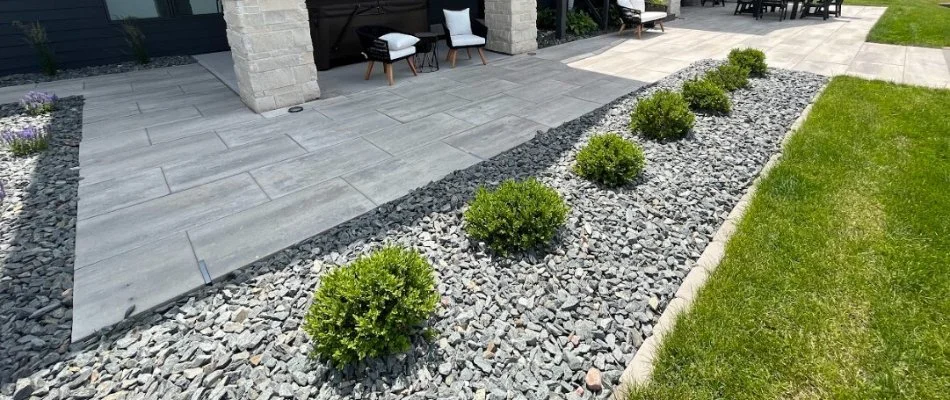 Rocks in a landscape bed on a property in Omaha, NE.