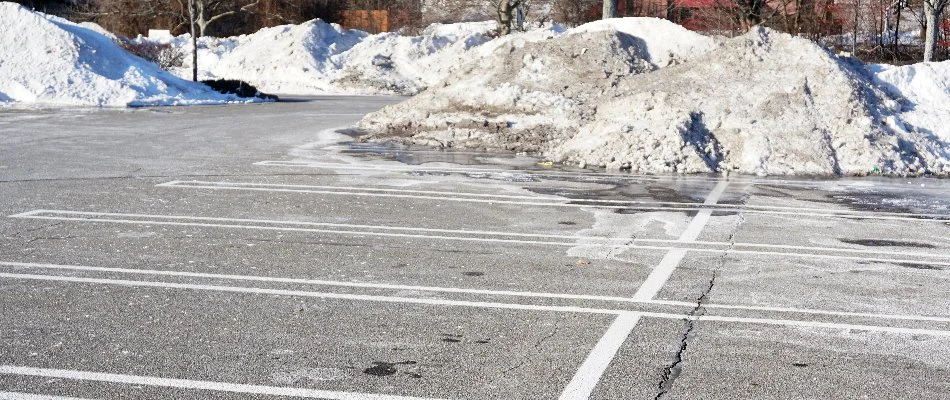 Snow piles in a commercial parking lot in Omaha, NE.