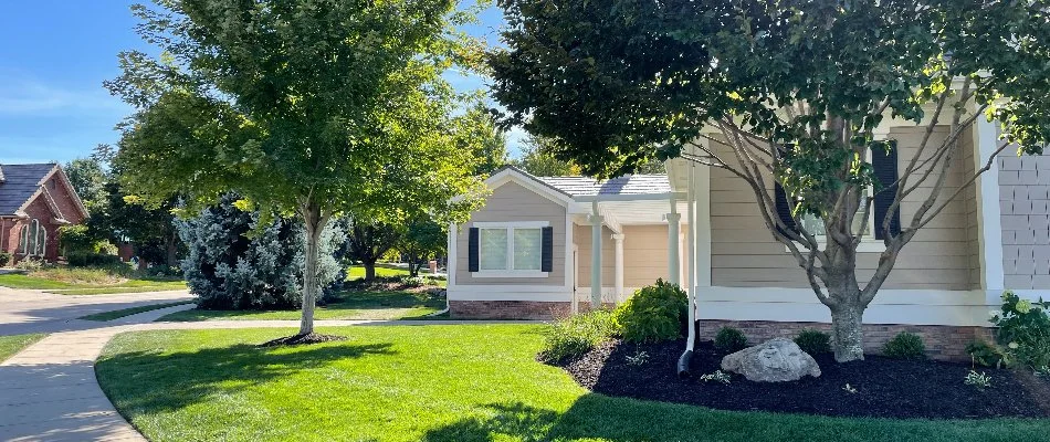 Front yard in residential area located in Bennington, NE.