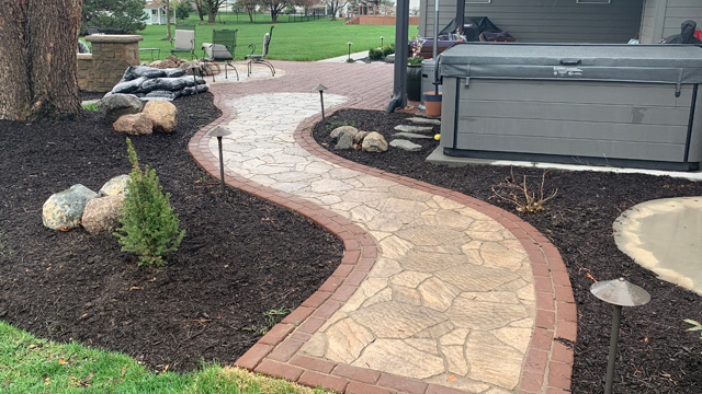 Irregular shaped pavers for walkway installed in Lincoln, NE.